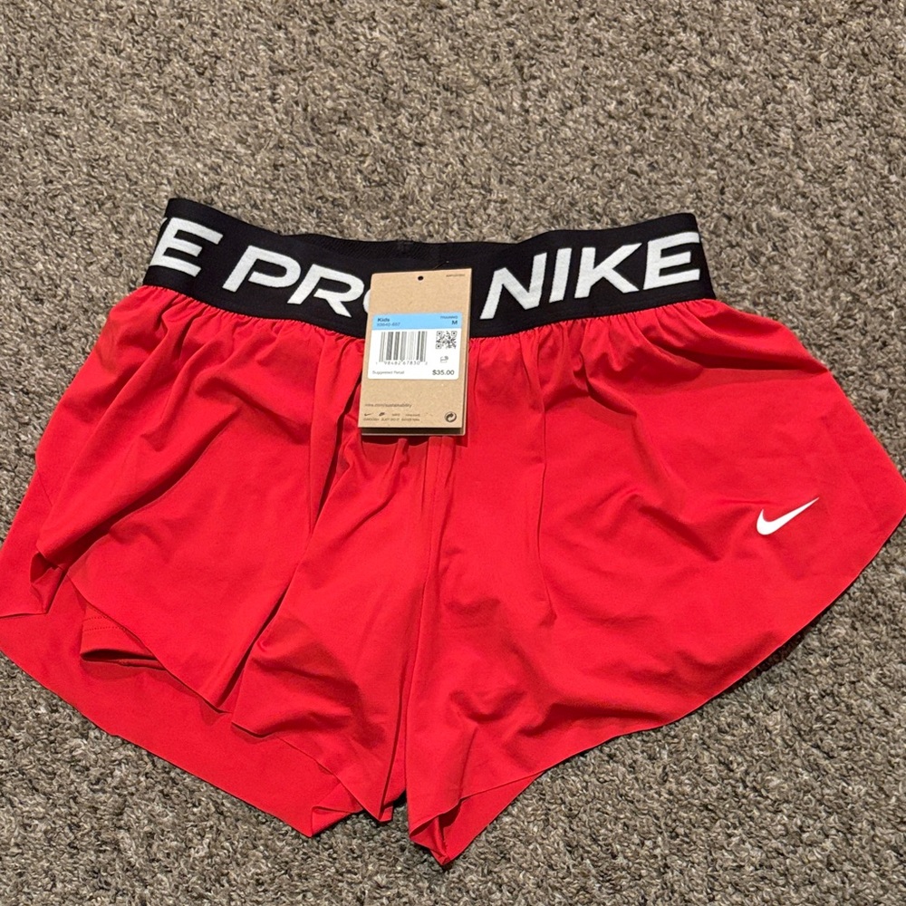 Youth Nike Pro shirts with Nike Pro short lining.